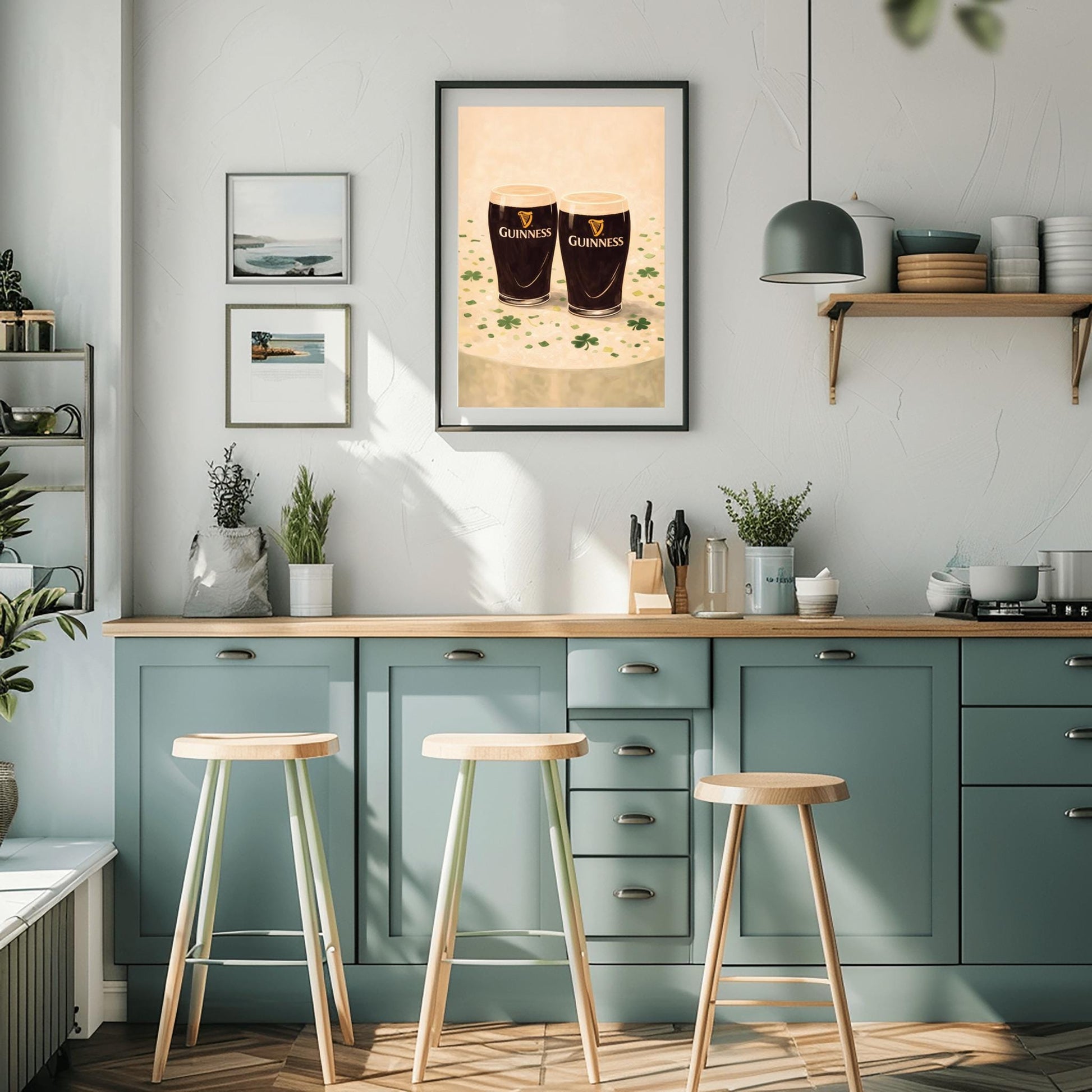 A vertical illustration of two pints of Guinness stout sitting side-by-side on a light cream surface. Green shamrocks and confetti are scattered around the base of the glasses. The pints feature the golden harp logo. The overall style is painterly and warm.