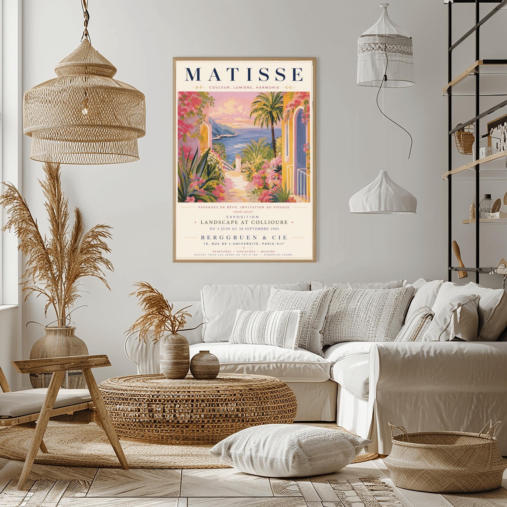 A French exhibition poster titled "MATISSE" at the top, featuring a pastel-toned painting of a Mediterranean coastal scene. A pathway lined with pink flowers, green agave plants, and yellow villas leads toward a blue sea and distant hills under a pink and gold sunset sky. A tall palm tree stands on the right. Elegant typography below the artwork text reads "Exposition Landscape at Collioure, Berggruen & Cie, Paris."