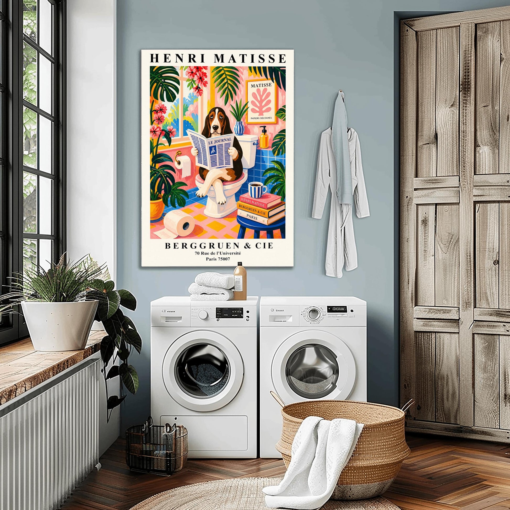A vertical maximalist art print designed as a Henri Matisse exhibition poster. A brown, black, and white Basset Hound is sitting on a white toilet with its legs crossed, holding and reading a newspaper titled "Le Journal." The bathroom is vibrantly colored with pink walls, blue wall tiles, and a pink and yellow checkered floor. The room is filled with large green tropical plants and red flowers. A stack of art books and a striped mug sit on a blue stool.