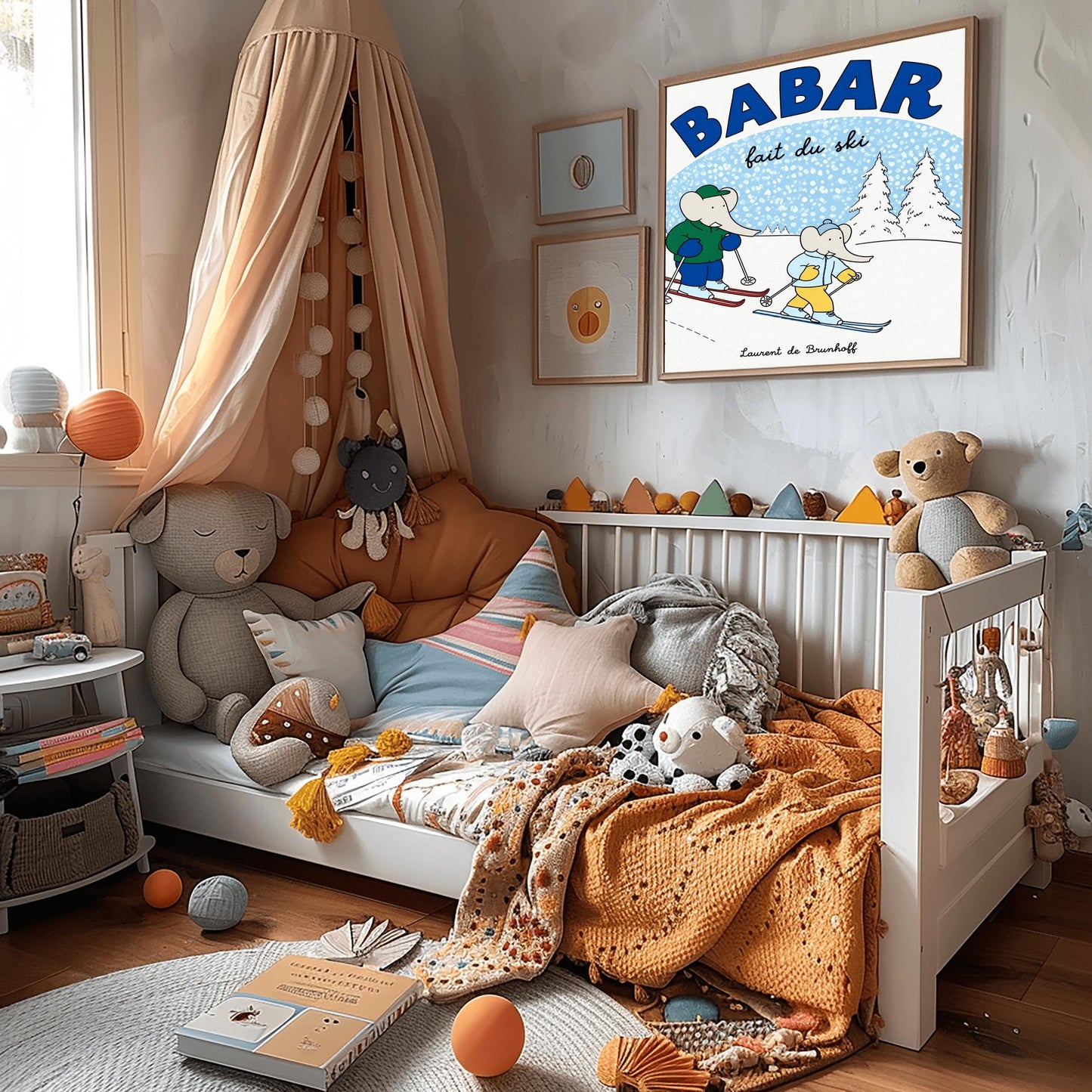 A horizontal children's art print featuring two cartoon elephants skiing down a white hill from left to right. The larger elephant, Babar, is in a green jacket with red skis. The smaller elephant is in a light blue jacket with blue skis. A large blue arch in the background represents a sky filled with white snow. Bold blue text at the top reads "BABAR" and script text below it says "fait du ski." The name "Laurent de Brunhoff" is centered at the bottom.