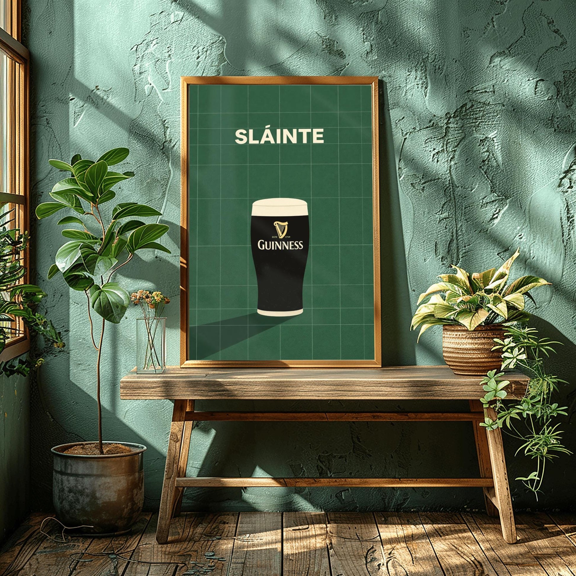 A vertical minimalist graphic with a dark green tiled background. A pint of Guinness with a gold harp logo sits at the bottom, casting a long shadow to the left. At the top, the word "SLÁINTE" is written in a bold, cream-colored font.