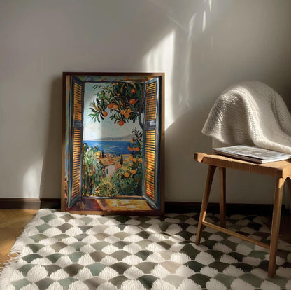 An impressionistic painting capturing a vibrant coastal view through an open window with orange louvered shutters. An orange tree laden with ripe fruit and lush green leaves frames the top right of the window. Beyond the window, a brilliant blue sea stretches to the horizon, meeting a distant coastline with buildings. In the midground, a terracotta-roofed building is nestled among vibrant green and yellow foliage. The brushstrokes are loose and expressive creating a dynamic and bright atmosphere