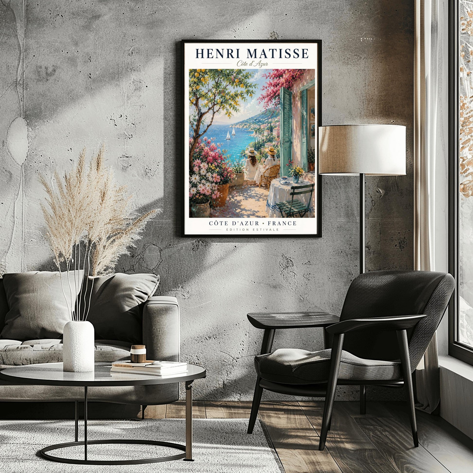 A vertical retro French exhibition poster for Henri Matisse Côte d'Azur on a wide ivory border, as seen in Screenshot 2026-06-06 at 23.18.59.png. The main image shows a beautiful summer illustration of a stone terrace overlooking the blue Mediterranean Sea where two white sailboats float. On the terrace, two women wearing white dresses and straw hats sit facing the water. To the left stands a green lemon tree with yellow fruit and large pots of pink and white flowers.