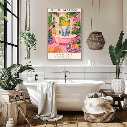 A vertical maximalist art print styled as a Henri Matisse exhibition poster. A light grey baby elephant is sitting in a large pink clawfoot bathtub filled with white bubbles. The bathroom features hot pink tiled floors, vibrant pink flowers, and lush green tropical plants. In the background, an arched window shows a bright golden sunset with palm tree silhouettes. A small yellow stool with towels and various blue and yellow ceramic vases decorate the room.