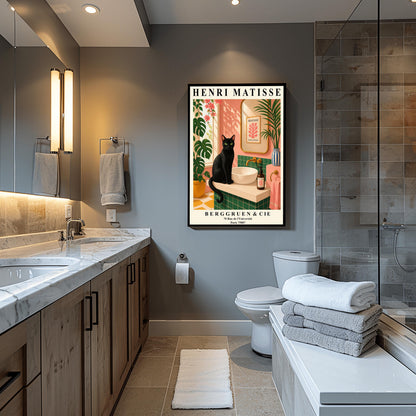 A vertical art print styled as a Henri Matisse exhibition poster. A sleek black cat with bright green eyes sits on a cream-colored bathroom vanity next to a white vessel sink. The bathroom features blush pink walls and emerald green tiles. A gold-framed mirror reflects a Matisse leaf print. Lush green plants and pink flowers frame the scene, and dappled sunlight creates shadows on the wall. The poster has bold black text at the top and bottom with the gallery name Berggruen & Cie.