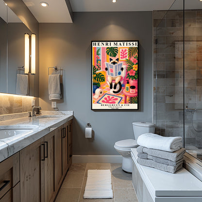 A vertical maximalist art print designed as a Henri Matisse exhibition poster. A cream-colored Siamese cat with dark brown points and blue eyes sits on a toilet, holding and reading a newspaper. The bathroom is vibrantly colored with pink walls, yellow and pink checkered tiles, and lush green monstera plants. A window with pink shutters looks out onto a blue sea. A pink bath mat with a leaf cut-out design and colorful soap jars add to the eclectic decor.