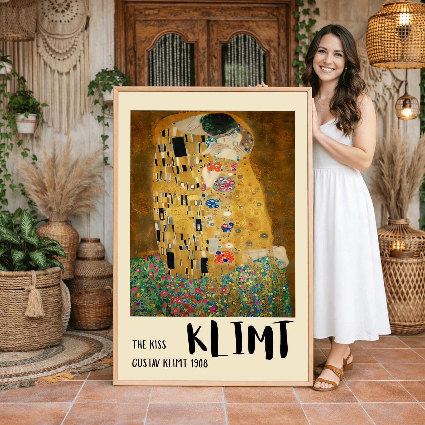 A vertical fine art print of "The Kiss" by Gustav Klimt. Two lovers are shown in an intimate embrace, their bodies covered in elaborate, decorative gold robes. The man's robe features black and white geometric shapes, while the woman's features colorful floral circles. They kneel on a lush bed of colorful wildflowers against a dark, shimmering gold background. The style is rich in mosaic-like patterns and Art Nouveau ornamentation.