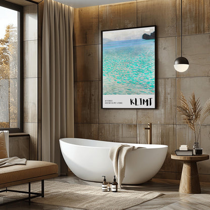 A vertical museum exhibition poster featuring Gustav Klimt's 1900 landscape painting "Attersee." The image depicts a close-up, shimmering view of a turquoise lake with a small dark island in the top right. The bottom border is soft grey with bold black text reading "ATTERSEE" and "KLIMT."