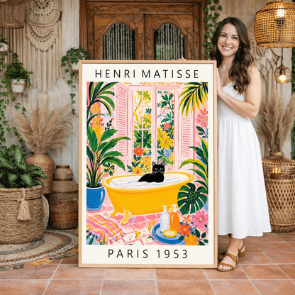 A vertical minimalist fine art exhibition poster in the style of Henri Matisse, featuring a wide white border layout. In the center, a solid black silhouette illustrates a cat in a crouching pose against a vibrant mustard yellow background block. The central composition is accented by flat paper-cut abstract shapes, including a royal blue coral leaf on the left and a terracotta red shape on the right against a solid white backdrop.