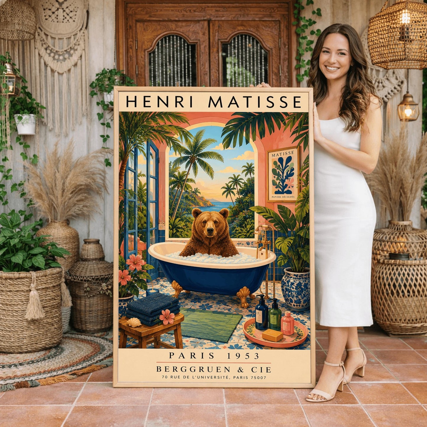 A vertical retro Henri Matisse exhibition poster on a wide cream border. The main image shows a surreal illustration of a large brown bear taking a bubble bath in a navy blue clawfoot tub with gold feet. The bathroom features blue patterned floor tiles, a pink wall with a framed Matisse cut-out poster, and a massive open arch window overlooking a tropical beach with palm trees and a blue ocean at sunset