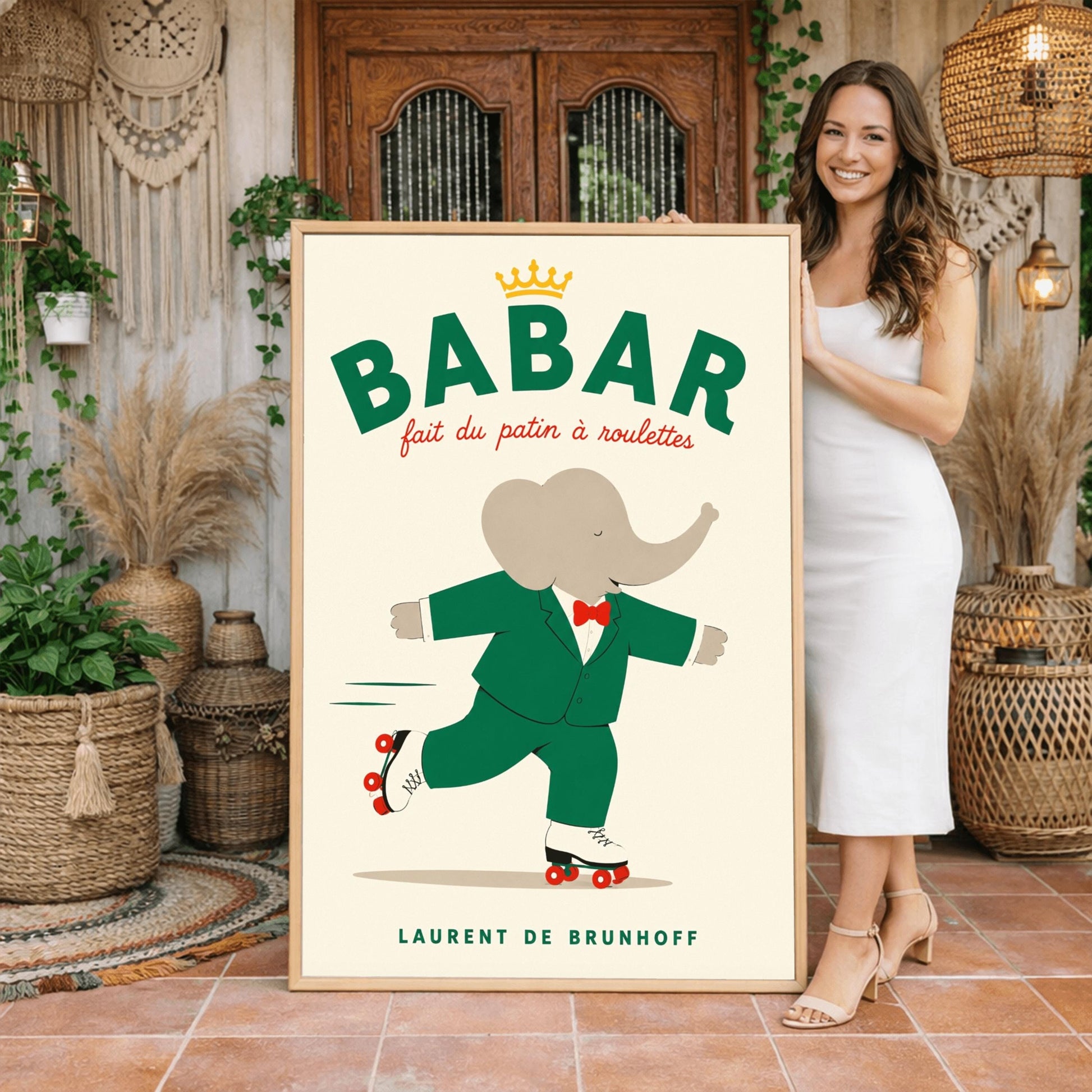 A vertical storybook-style art print of Babar the Elephant roller skating against a cream background. Babar is wearing his signature green suit and red bow tie. He is balanced on white roller skates with red wheels, with one foot lifted behind him. The top of the print features the word "BABAR" in large green letters above the red script text "fait du patin à roulettes" and a small gold crown. The name "LAURENT DE BRUNHOFF" is printed at the bottom.