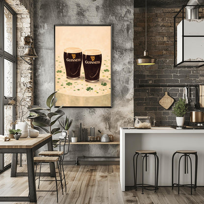 A vertical illustration of two pints of Guinness stout sitting side-by-side on a light cream surface. Green shamrocks and confetti are scattered around the base of the glasses. The pints feature the golden harp logo. The overall style is painterly and warm.