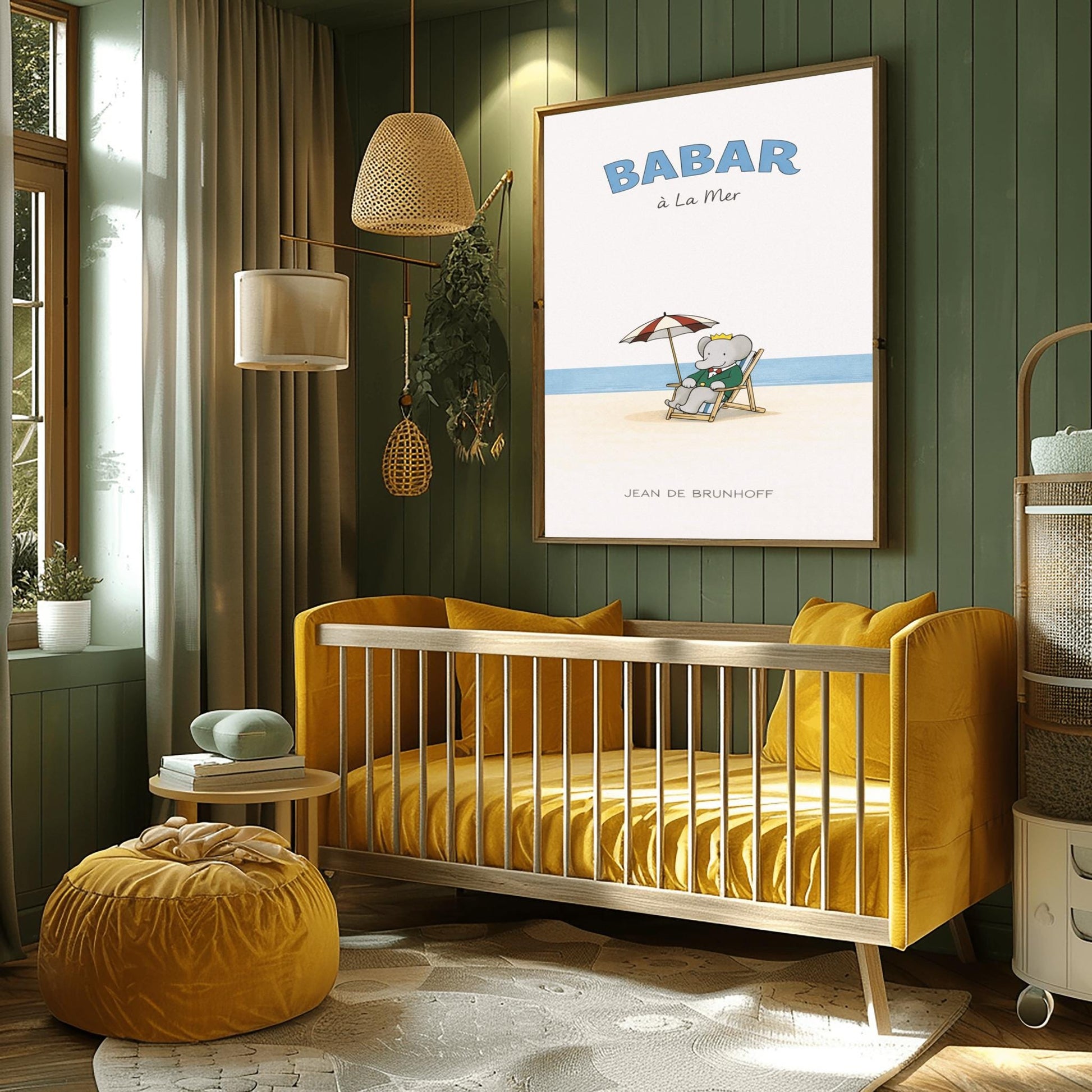 A vertical children's illustration poster titled "BABAR à La Mer" in light blue. In the center, an elephant (Babar) in a green suit and crown is sitting in a wooden lounge chair on a sandy beach. A red and white striped umbrella is behind him. In the background, a thin blue line represents the sea under a white sky. The name "JEAN DE BRUNHOFF" is at the bottom.