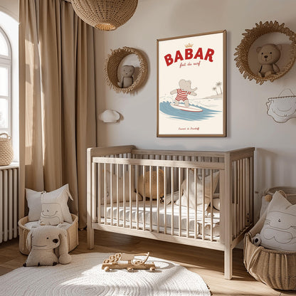 A vertical storybook-style art print of Babar the Elephant surfing. Babar is wearing a red and white striped swimsuit and standing on a white surfboard with a red stripe. He is riding a blue wave with a white crest. In the background, there is a tan beach with two palm trees under a cream sky. The top reads "BABAR fait du surf" with a small gold crown.