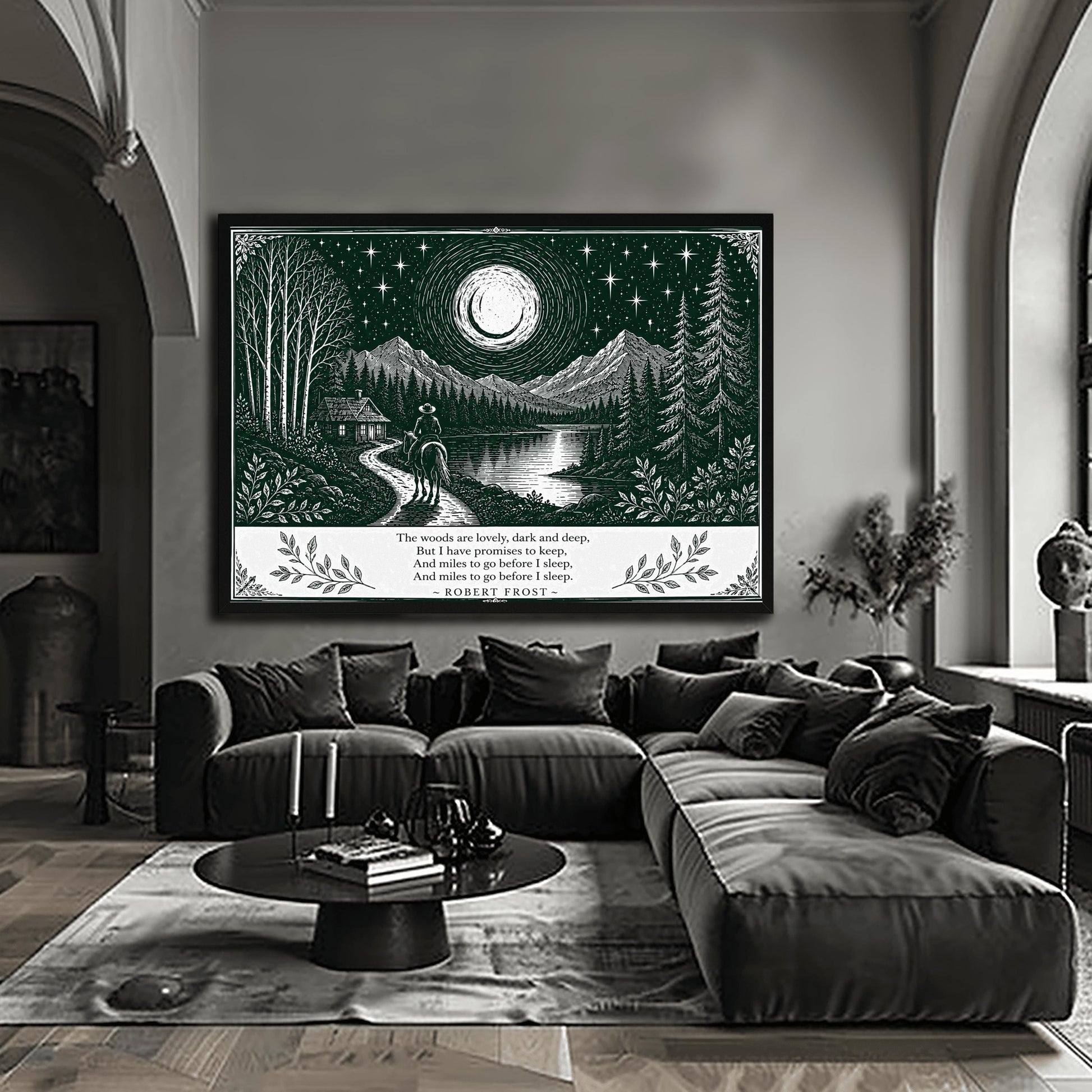 A wide horizontal art print in forest green and cream. A person on horseback follows a path toward a small cabin by a lake. In the background are tall pine forests and sharp mountain peaks under a massive moon and starry sky. The bottom of the print contains four lines of Robert Frost’s poetry in clean serif text, flanked by simple leaf illustrations.