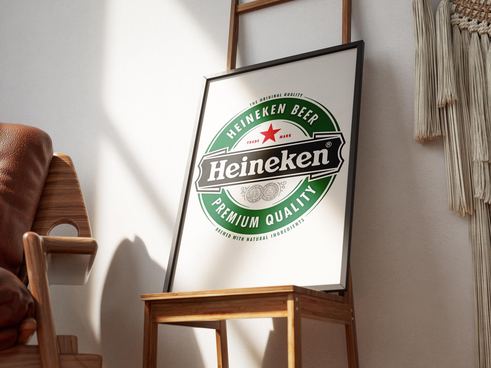 A sharp, bold art print featuring the iconic Heineken beer logo. The design prominently displays the vibrant green background, the distinct red star, and the crisp white 'Heineken' typography. This clean, graphic representation of the famous beverage brand is perfect for modern bar decor, a stylish man cave, pub wall art, or a contemporary kitchen. It's an ideal digital print gift for any Heineken enthusiast or collector of iconic beer branding, adding a sleek touch to any space.