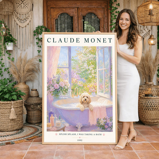 A vertical art print in a soft impressionist style. A small, fluffy, cream-colored dog sits in a lavender-colored bathtub filled with soapy bubbles. The tub is by an open window overlooking a sunlit garden of pink and purple flowers. The top of the print says "CLAUDE MONET" in a dark serif font. The bottom features the text "SPLISH SPLASH, I WAS TAKING A BATH" with small pink paw prints.