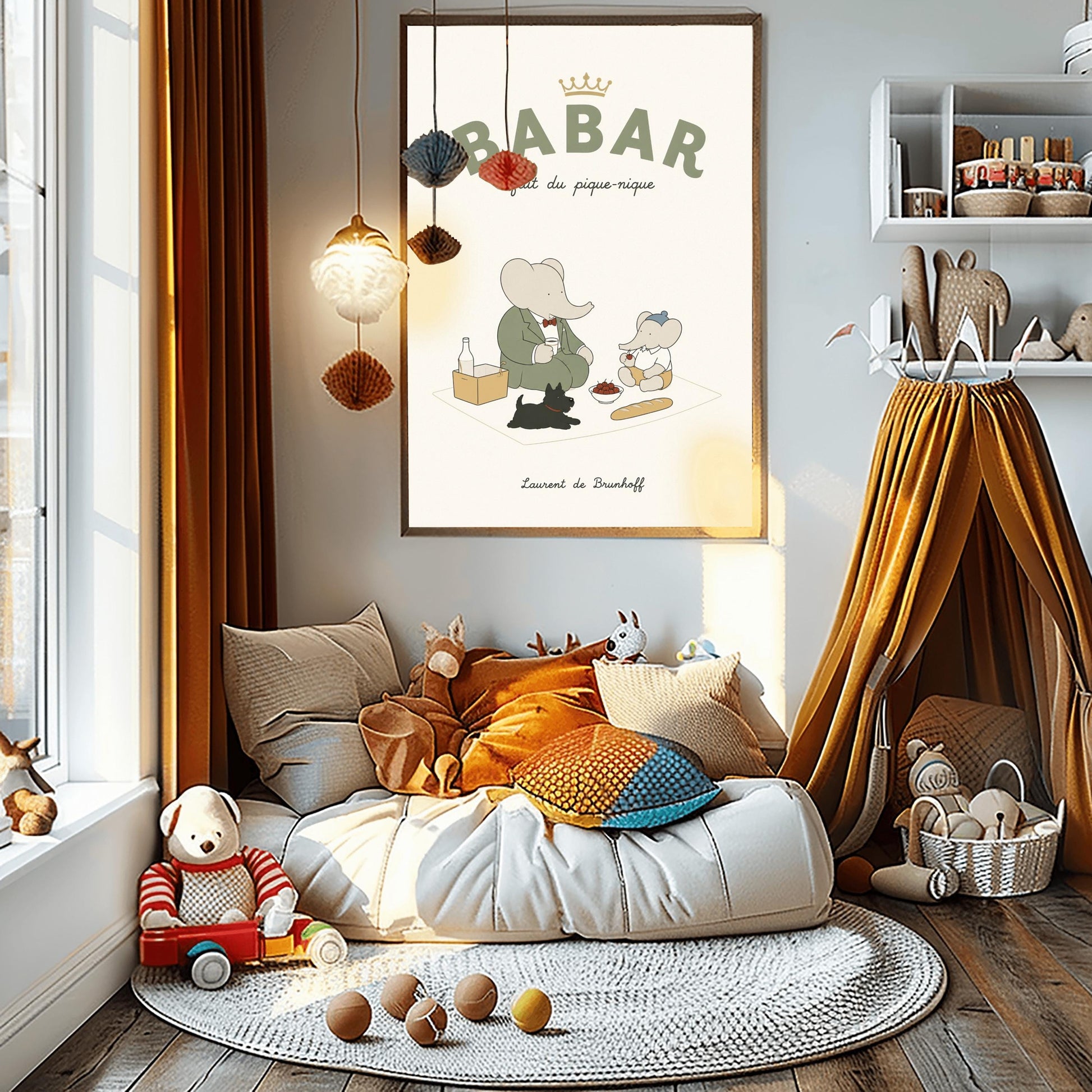 A vertical storybook-style art print of Babar the Elephant having a picnic against a cream background. Babar, in a green suit, sits on a white blanket with a smaller elephant in a blue hat and yellow shorts. A small black dog lies in the foreground. The spread includes a baguette, a bowl of cherries, and a bottle. The top reads "BABAR fait du pique-nique" with a gold crown, and the bottom says "Laurent de Brunhoff."