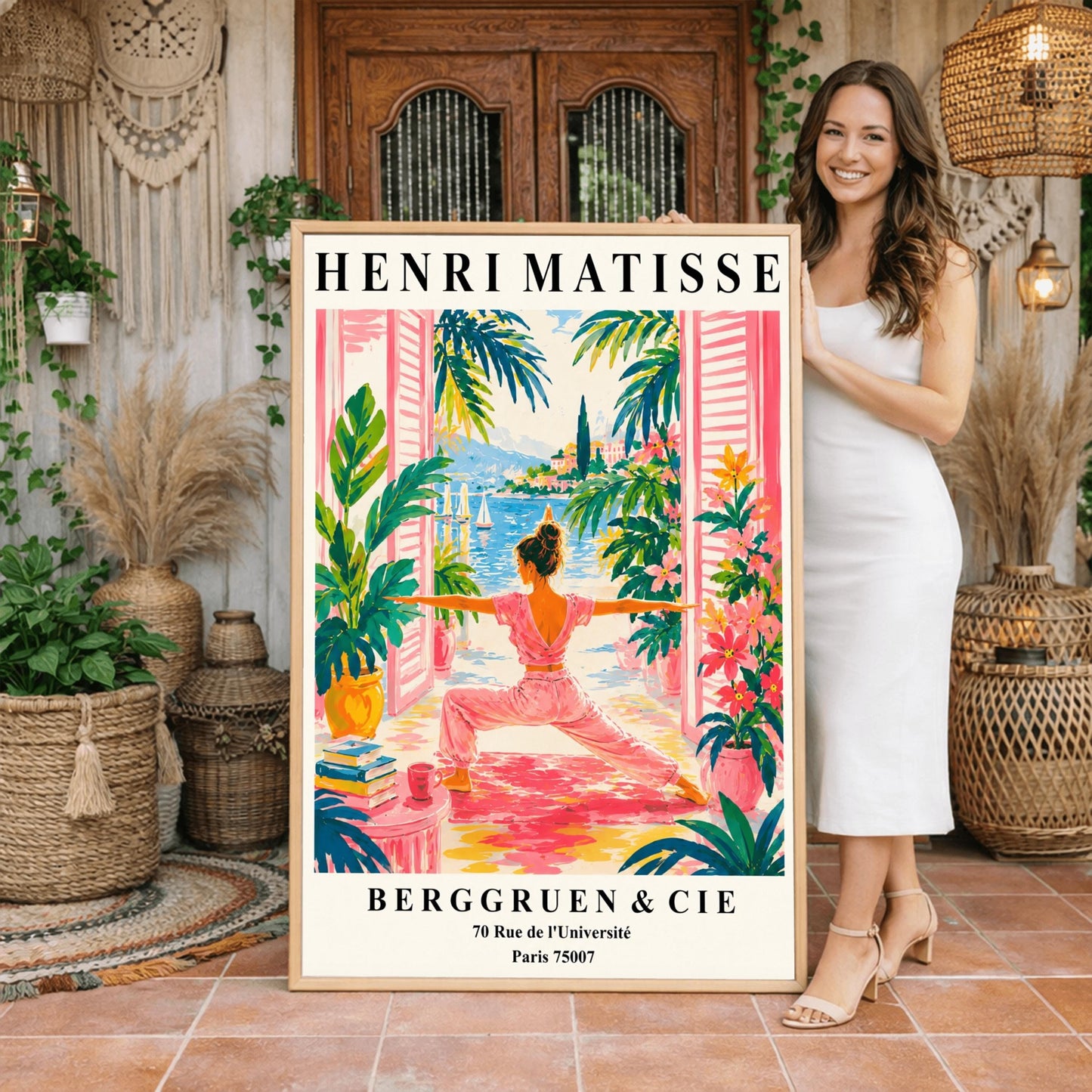 A vertical museum-style exhibition poster with a cream border featuring text for an Henri Matisse exhibition at Berggruen & Cie in Paris,. The colorful central illustration depicts a woman from behind practicing a yoga pose on a pink mat on a terrace. She is framed by open pink shutters and lush green potted plants. Through the open doors is a scenic view of a bright blue sea with sailboats, a coastal hill town, and green palm trees under a sunny sky.