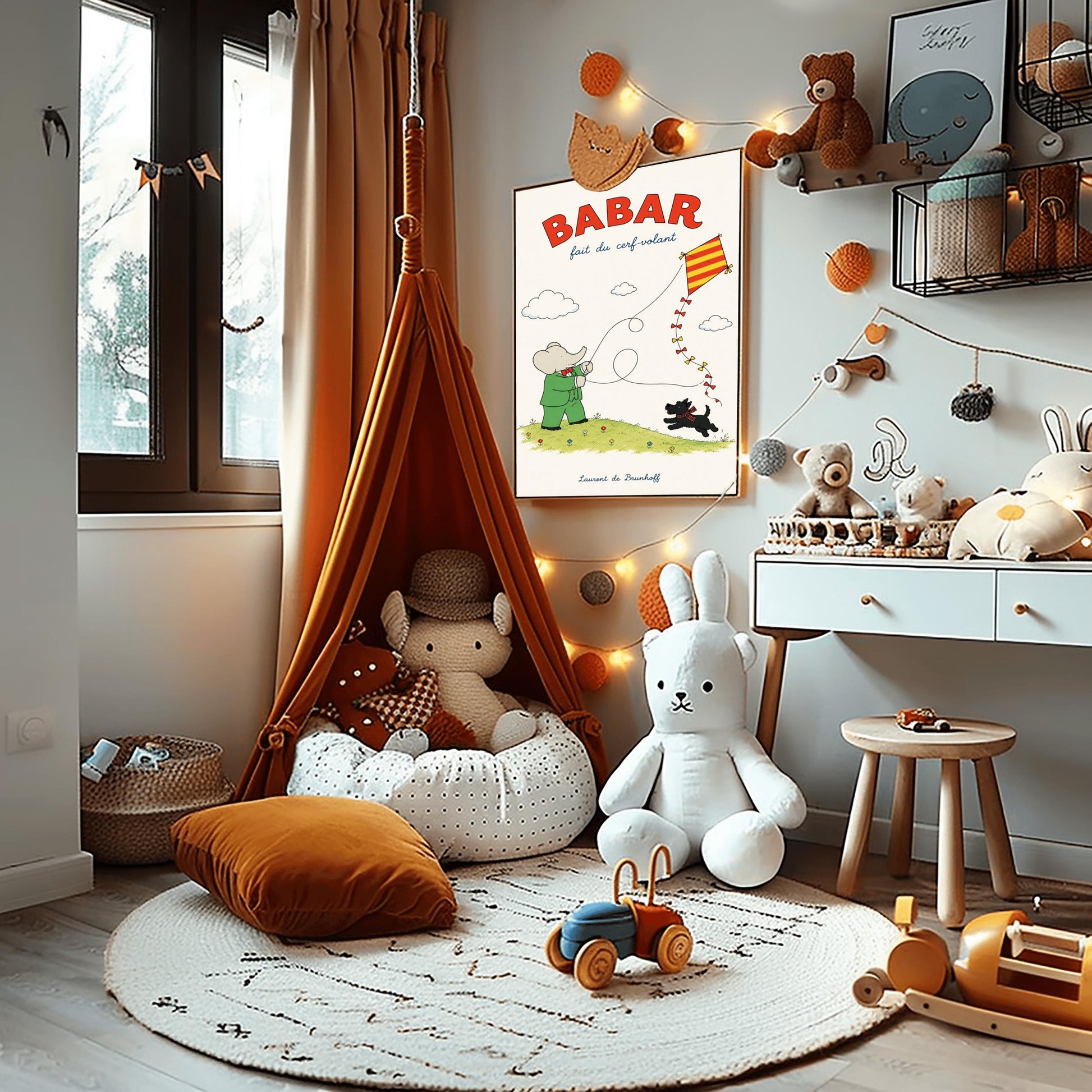 A vertical retro fine art exhibition poster titled "BABAR fait du cerf-volant" on a wide cream border. The top "BABAR" text is printed in a bold red font. The illustration shows an elephant in a green suit and red bowtie flying a red and yellow striped diamond kite on a green grassy hill with small flowers. A small black dog in a plaid scarf runs on the hill below, and the name "Laurent de Brunhoff" anchors the bottom.