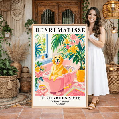 A vertical minimalist fine art exhibition poster in the style of Henri Matisse, bordered by a wide white frame margin. In the center, a simple black line drawing outlines the head and happy expression of a Golden Retriever dog. The composition is accented by vibrant, flat paper-cut abstract shapes, including a royal blue coral leaf on the left, a terracotta red shape on the right, and a mustard yellow block at the base against a clean white background.