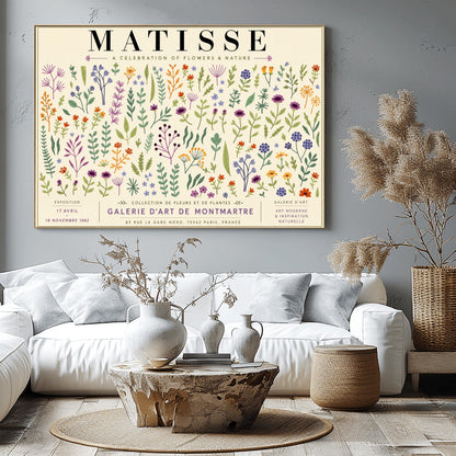 A vertical gallery exhibition poster with a warm cream border. Bold black text at the top reads "HENRI MATISSE". The central artwork is a rectangular block with a solid sand-beige background, featuring a cream silhouette of an abstract, four-petaled flower with a circular center.