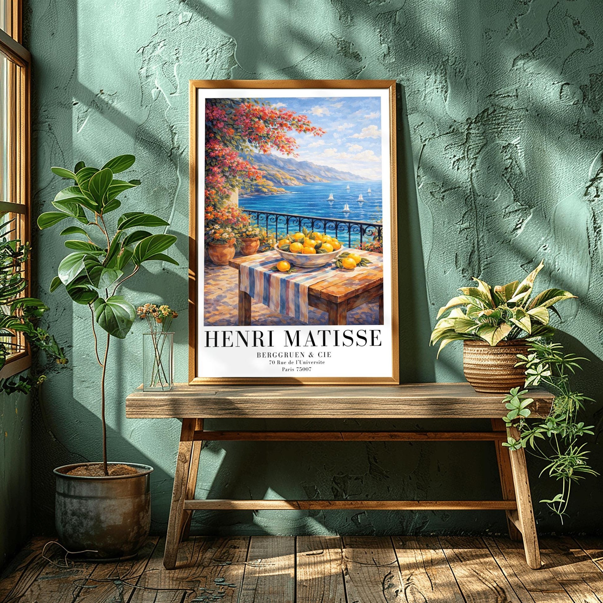 A vertical painterly illustration of a stone terrace with a black iron railing. A pink bougainvillea tree hangs from the top left over a wooden table with a bowl of oranges and lemons. Beyond the railing is a blue sea with white sailboats and a distant mountainous coastline.