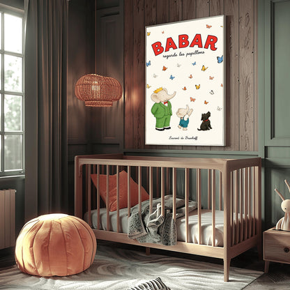 A vertical retro fine art exhibition poster titled "BABAR regarde les papillons" on a wide cream border. The top "BABAR" text is printed in a bold red font. The illustration shows an elephant wearing a crown and green suit standing next to a smaller elephant reaching up toward a sky filled with dozens of colorful blue, yellow, orange, and white butterflies. A small black dog sits patiently on the ground looking up at them. The name "Laurent de Brunhoff" anchors the bottom.
