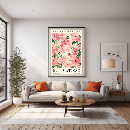 A vertical art print styled as a Henri Matisse exhibition poster. The central image is a dense pattern of soft pink and rose-colored flowers with dark green leaves on a cream-colored background. The flowers are painted with visible, textured brushstrokes. Above the image, the words "PAPIERS DÉCOUPÉS" are written in a black serif font. Below the image, the text reads "H. MATISSE" in large letters, with "ECOLE DE PARIS" and "FRANCE 1890" in smaller text at the bottom.