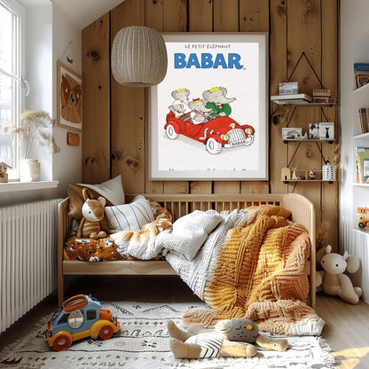 A vertical children's illustration poster. At the top, "LE PETIT ÉLÉPHANT" is written in small letters above the word "BABAR" in large blue block letters. In the center, four elephants are riding in a bright red vintage open-top convertible. A young elephant is driving, Babar is in the passenger seat in a green suit, and two smaller elephants are in the back. The car has a "BABAR" license plate. The text at the bottom says "Venez rencontrer Babar et sa famille."