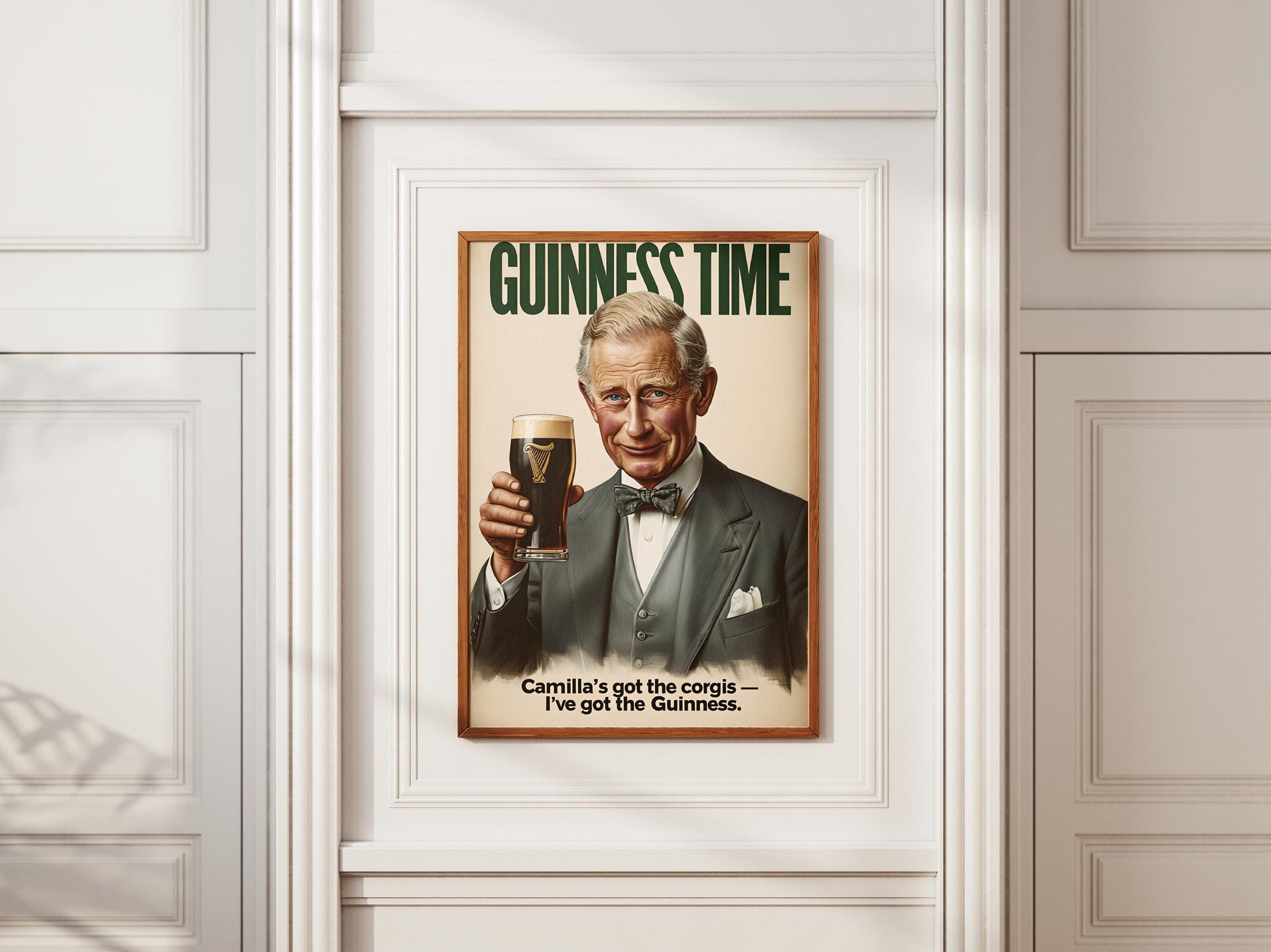 A humorous art print featuring King Charles III holding a classic pint of Guinness. The illustration shows him smiling with the iconic dark stout and creamy head. The text 'GUINNESS TIME' appears at the top, and 'Camilla's got the corgis — I've got the Guinness.' at the bottom, adding a witty royal touch. This unique print is ideal for pub or bar decor, a man cave, or as a quirky gift for fans of the British Royal Family and Guinness beer, blending humor with an iconic beverage