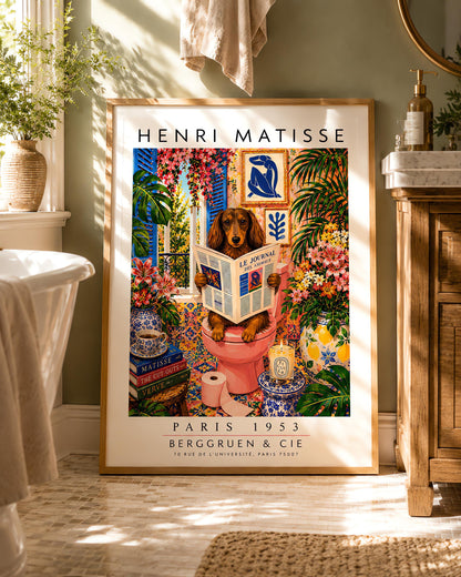 A vertical vintage-style art exhibition poster titled "HENRI MATISSE" at the top and "PARIS 1953 BERGGRUEN & CIE" at the bottom. The main image features a long-haired brown Dachshund dog sitting on a pink toilet inside an incredibly ornate bathroom, reading a newspaper titled "LE JOURNAL DES ANIMAUX". The background is a dense, colorful display of patterned wall tiles, framed Matisse paper cutouts, large green tropical houseplants, and vases full of pink lilies and flowers.