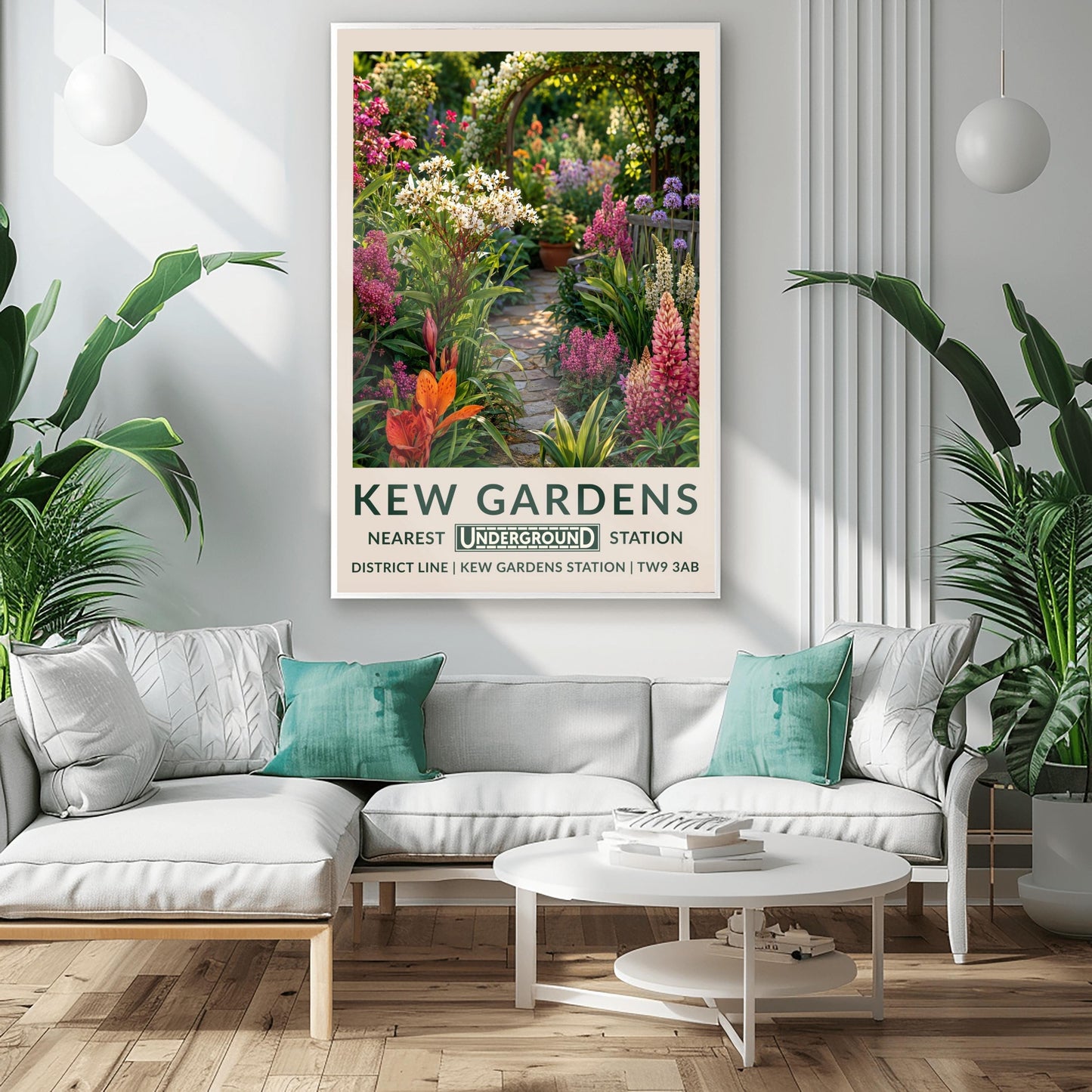 A vertical retro London Underground travel poster for Kew Gardens on a wide cream border. The top image shows a close-up, beautifully detailed illustration of a winding cobblestone garden pathway surrounded by dense flower borders. The foreground features tall pink lupins, a bright orange lily, and clusters of small white flowers. On the right sits a grey wooden bench under purple alliums. The path leads to a wooden archway covered in climbing white roses in the background.