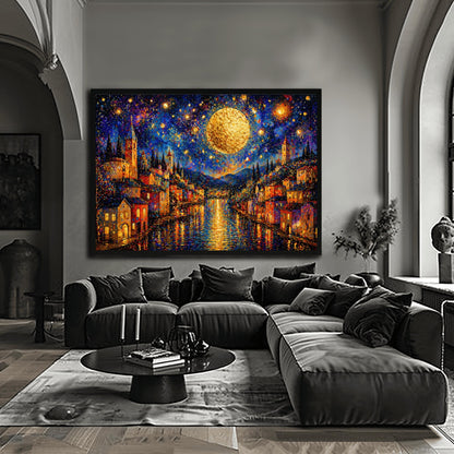 A horizontal art print in a decorative mosaic style inspired by Gustav Klimt. A coastal town with warm-lit houses and tall church towers lines both sides of a dark blue canal. A massive, glowing golden moon hangs in a deep indigo sky filled with swirling stars and shimmering golden circles. The lights of the town and the moon reflect brilliantly on the rippling water. The entire scene is composed of intricate, sparkling patterns and vibrant jewel-toned colors.