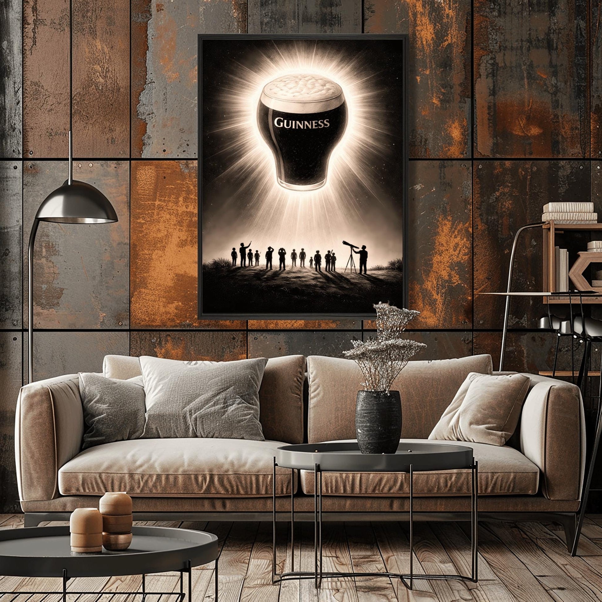 A vertical charcoal-style illustration. A pint of Guinness floats in a dark night sky like a solar eclipse, with bright rays of light radiating from behind the glass. Below, a group of tiny human silhouettes and one person with a telescope look up in wonder at the floating beer.