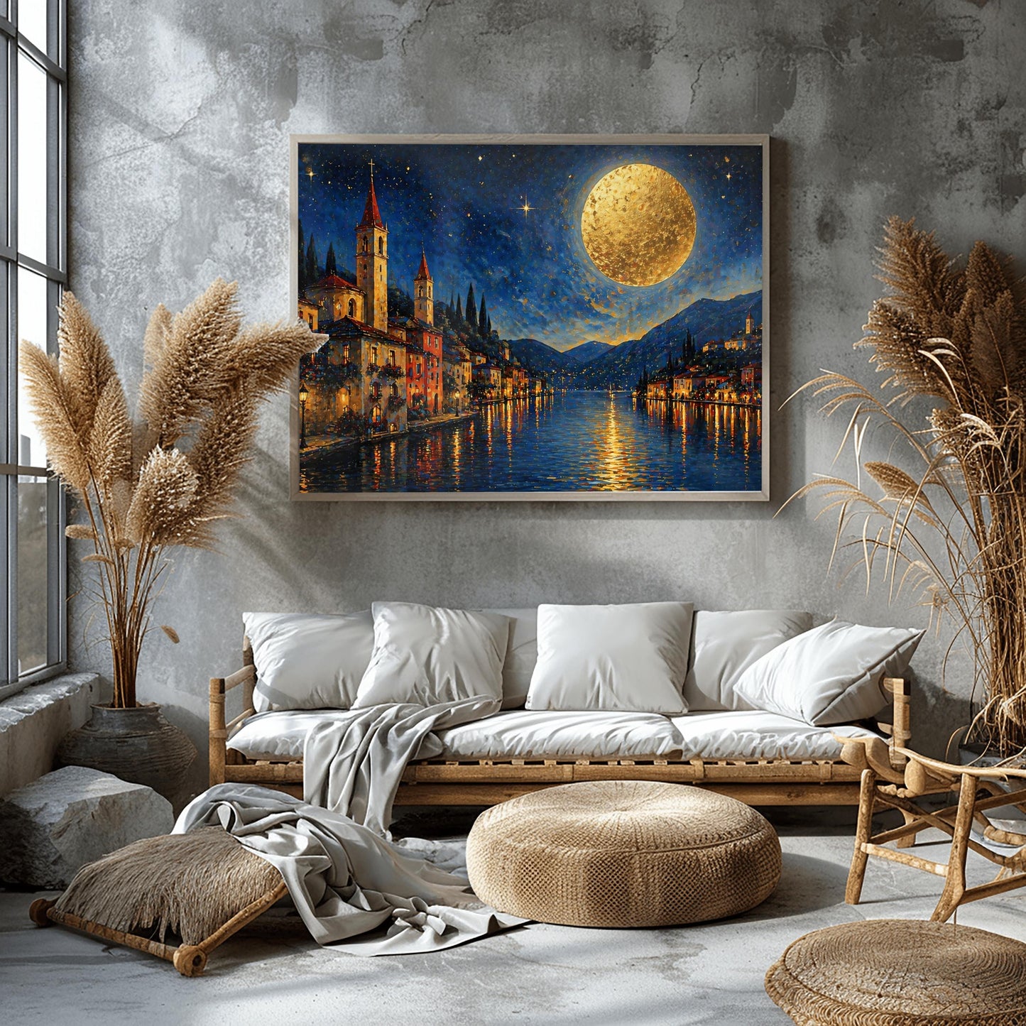 A horizontal art print in a decorative mosaic style inspired by Gustav Klimt. A charming lakeside village with warm-lit windows and tall church spires sits along the edge of dark blue water. A massive, glowing golden moon with heavy texture hangs in a starry night sky. The light from the moon and the town reflects in long, shimmering streaks on the water. The mountains in the distance are shaded in soft blues and purples.