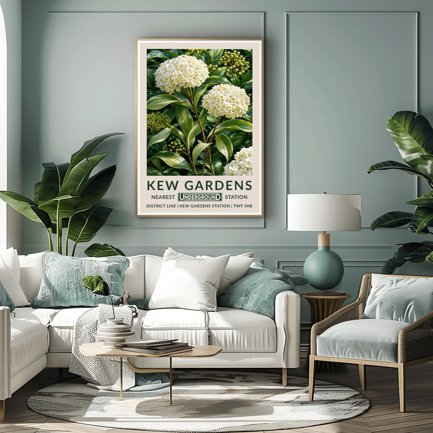A vertical retro London Underground travel poster for Kew Gardens on a wide cream border. The top image shows a close-up, detailed botanical illustration of two large, round white hydrangea flower clusters surrounded by long, variegated green and white leaves and small green berries. The bottom cream border features the text "KEW GARDENS" in dark green, followed by "NEAREST UNDERGROUND STATION" flanking an authentic boxed Underground logo