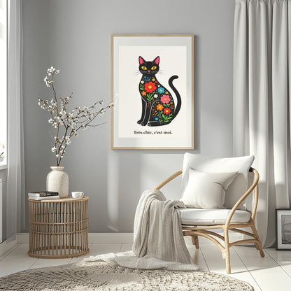 A vertical minimalist art print of a sleek black cat sitting upright, facing forward. The cat's body is filled with colorful folk-art style flowers in red, blue, orange, and yellow with green leaves. The cat has large yellow eyes and a small pink nose. Below the cat, the French phrase "Très chic, c'est moi." is written in a black serif font. The entire image is set against a textured off-white background.