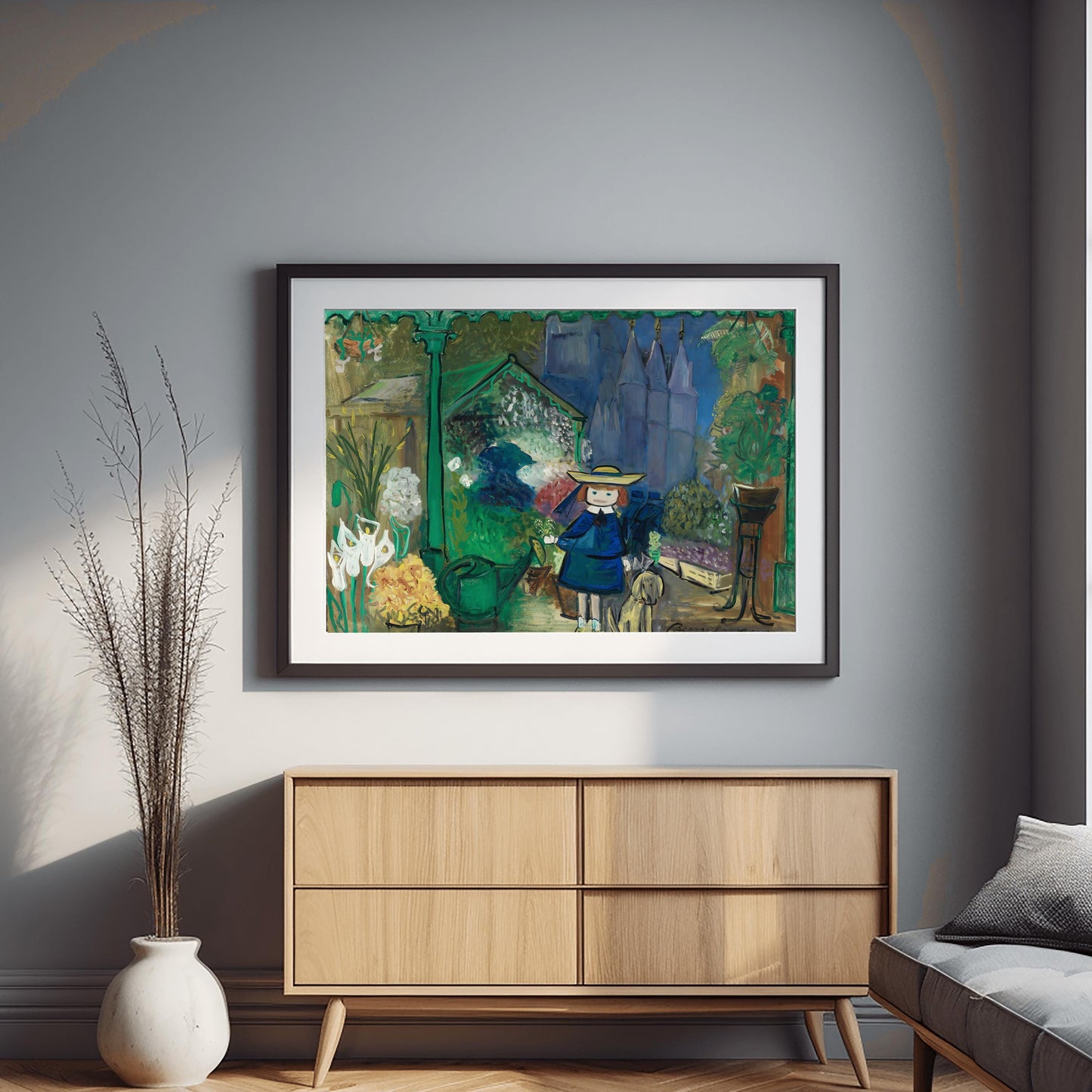 A horizontal whimsical painting of a young girl, Madeline, in a yellow hat and blue coat standing in a lush flower market. She is holding a small white flower and stands next to a small yellow dog. The scene is filled with white lilies, yellow flowers, and various green plants. A green watering can sits on the ground. In the background, large blue cathedral spires rise into a dark blue sky. The painting has a thick, textured style with visible brushstrokes and the signature "Bemelmans"