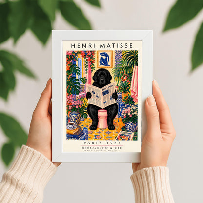 A vertical vintage-style art exhibition poster titled "HENRI MATISSE" at the top and "PARIS 1953 BERGGRUEN & CIE" at the bottom. The main image shows a large, fluffy black Newfoundland dog sitting on a pink toilet in a highly decorated bathroom, reading a newspaper. The room is filled with yellow pattern tiles, blue-and-white wallpaper, a blue Matisse cutout art frame on the wall, multiple large green houseplants, and vases filled with colorful pink flowers.