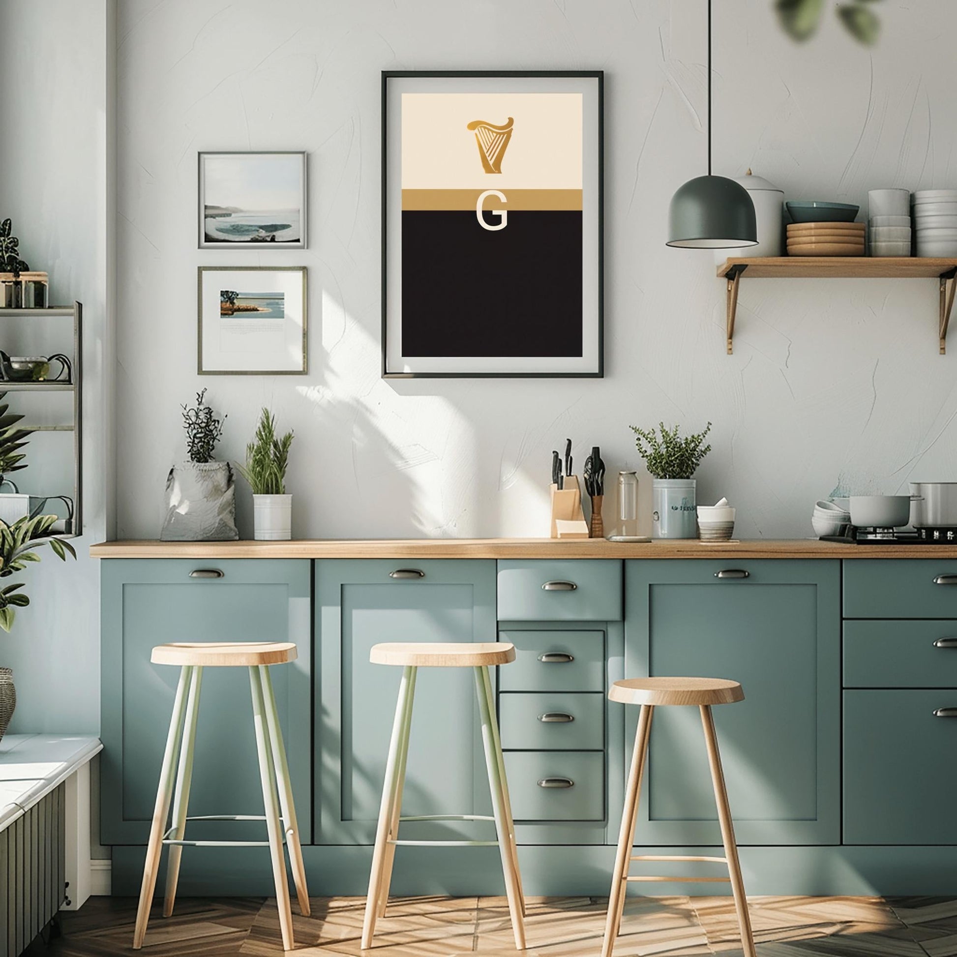 A vertical minimalist graphic art print. The top half is cream-colored with a golden harp icon at the top. A large, white serif letter "G" is centered in the middle but is split in half by a horizontal gold band. The bottom half of the poster is solid, deep black. The design is a modern, graphic tribute to the Guinness brand colors and symbols.