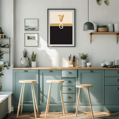 A vertical minimalist graphic art print. The top half is cream-colored with a golden harp icon at the top. A large, white serif letter "G" is centered in the middle but is split in half by a horizontal gold band. The bottom half of the poster is solid, deep black. The design is a modern, graphic tribute to the Guinness brand colors and symbols.