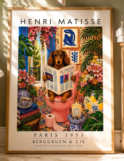 A vertical vintage-style art exhibition poster titled "HENRI MATISSE" at the top and "PARIS 1953 BERGGRUEN & CIE" at the bottom. The main image features a long-haired brown Dachshund dog sitting on a pink toilet inside an incredibly ornate bathroom, reading a newspaper titled "LE JOURNAL DES ANIMAUX". The background is a dense, colorful display of patterned wall tiles, framed Matisse paper cutouts, large green tropical houseplants, and vases full of pink lilies and flowers.