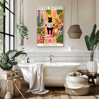 A vertical maximalist art print styled as a Henri Matisse exhibition poster. A sleek black cat with bright yellow eyes sits on a pink toilet, holding and reading a newspaper. The bathroom is filled with vibrant yellow walls, pink and yellow checkered tiles, and lush green monstera plants. A window with blue shutters looks out onto a garden. A pink bath mat and blue floral vases add more color. Bold black text at the top reads "HENRI MATISSE" and at the bottom "PARIS 1953".