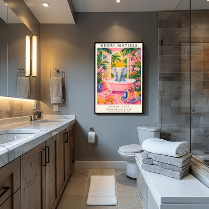 A vertical maximalist art print styled as a Henri Matisse exhibition poster. A light grey baby elephant is sitting in a large pink clawfoot bathtub filled with white bubbles. The bathroom features hot pink tiled floors, vibrant pink flowers, and lush green tropical plants. In the background, an arched window shows a bright golden sunset with palm tree silhouettes. A small yellow stool with towels and various blue and yellow ceramic vases decorate the room.