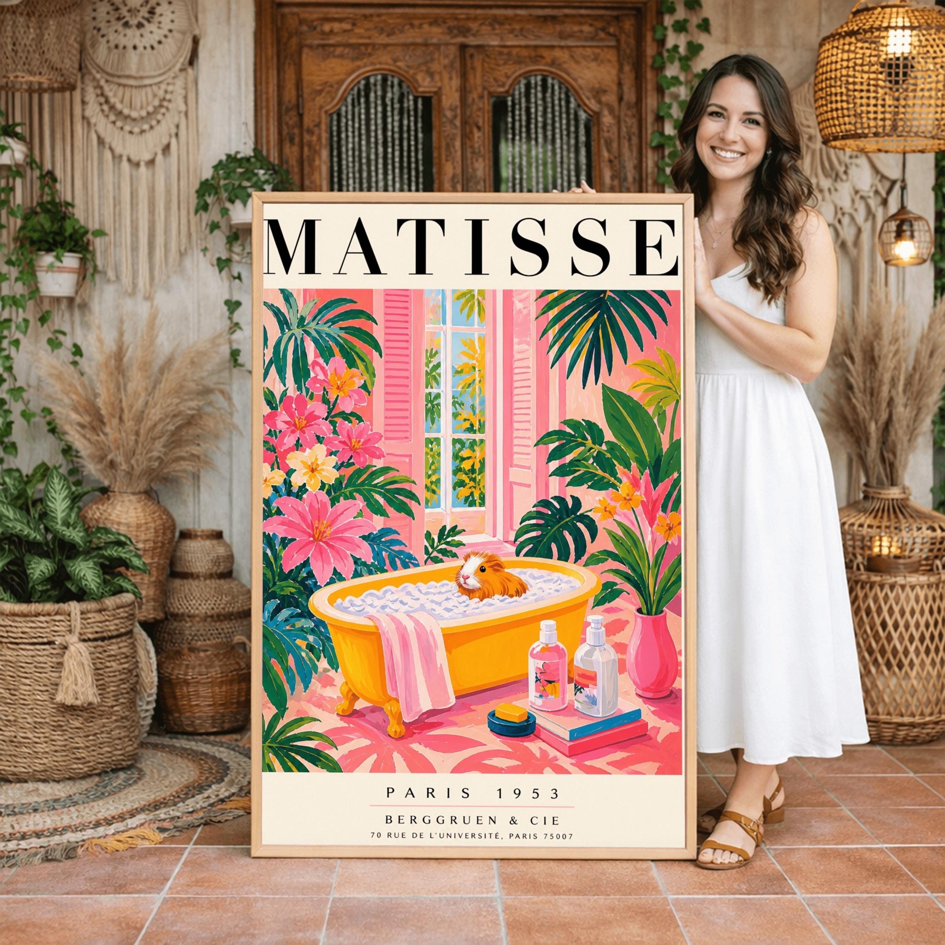 A vertical maximalist art print styled as a Henri Matisse exhibition poster. A small orange and white guinea pig sits in a bright yellow clawfoot bathtub filled with white bubbles. The bathroom is vibrant with pink walls and a pink patterned floor. Lush green monstera plants and pink flowers frame the scene. In the foreground, soap bottles sit on a stack of books next to a pink vase. An open window with pink shutters shows tropical trees in the background.