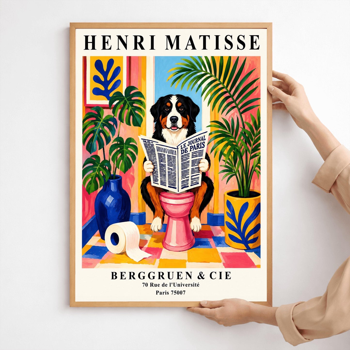 A vertical retro exhibition poster for Henri Matisse set on a wide cream border. The central image shows a colorful, painterly Fauvism illustration of a fluffy black, white, and tan Bernese Mountain Dog sitting on a pink toilet. The dog is looking forward with a slight smile while holding open a large newspaper titled "LE JOURNAL DE PARIS". The background is a bright, sunlit bathroom with pink and yellow walls, a checkered tile floor, a framed blue coral print