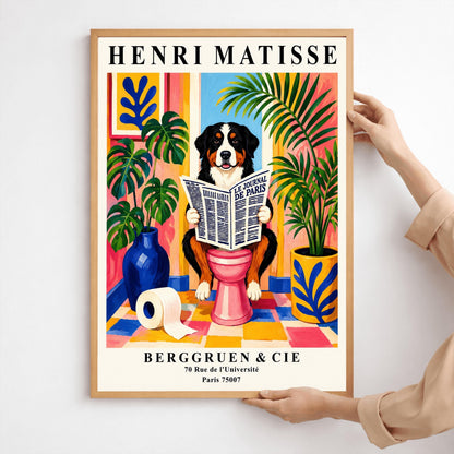 A vertical retro exhibition poster for Henri Matisse set on a wide cream border. The central image shows a colorful, painterly Fauvism illustration of a fluffy black, white, and tan Bernese Mountain Dog sitting on a pink toilet. The dog is looking forward with a slight smile while holding open a large newspaper titled "LE JOURNAL DE PARIS". The background is a bright, sunlit bathroom with pink and yellow walls, a checkered tile floor, a framed blue coral print
