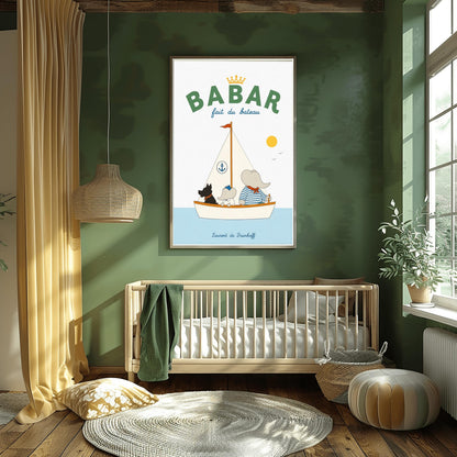 A vertical storybook-style art print of Babar the Elephant sailing a boat against a white background. Babar, wearing a blue and white striped shirt and a red neckerchief, sits in a white boat with a smaller elephant and a black dog. The sailboat has a white sail with a blue anchor logo and a red flag on top. A yellow sun and two small birds are in the sky. The top reads "BABAR fait du bateau" with a gold crown.