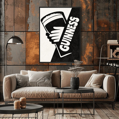 A vertical minimalist graphic divided diagonally into cream and black sections. A white hand holds a pint of Guinness against the black side. The word "GUINNESS" is written vertically in bold white text along the diagonal split.